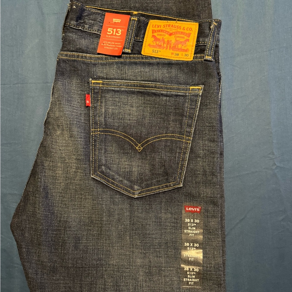 SOLD                   Levi's Men's Dark Wash Slim Straight Jeans